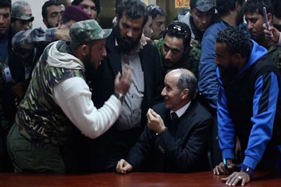 Libya suspends transitional government members