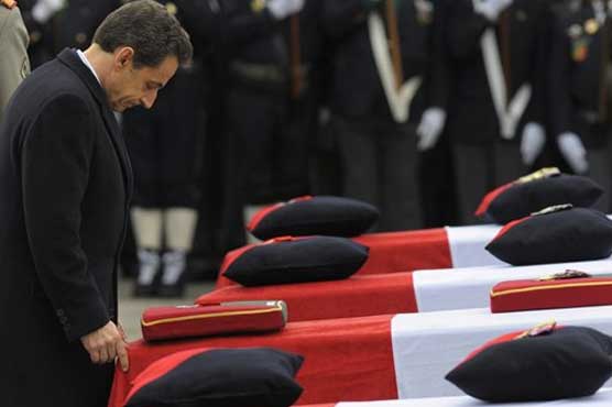 France honors 4 troops killed by Afghan soldier
