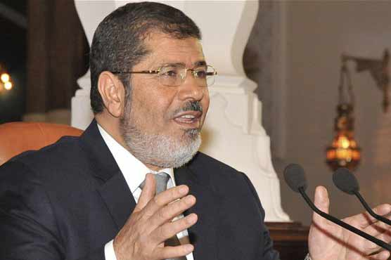 Morsi takes Egypt helm, military pledges support 