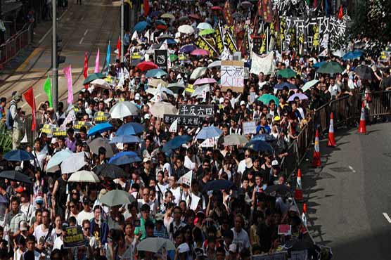 Thousands turn to Hong Kong streets against new leader 