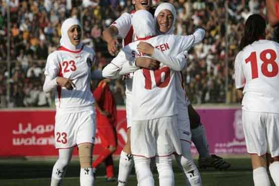 Football chiefs lift ban on women wearing headscarves