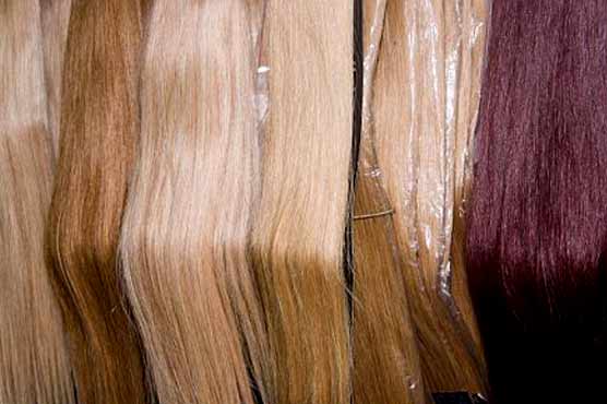 Thieves bust through wall to steal hair extensions