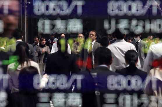 Asian stocks fall as outlook for earnings dims  