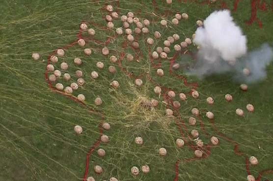 Artist protests against hunger -- by blowing up bread