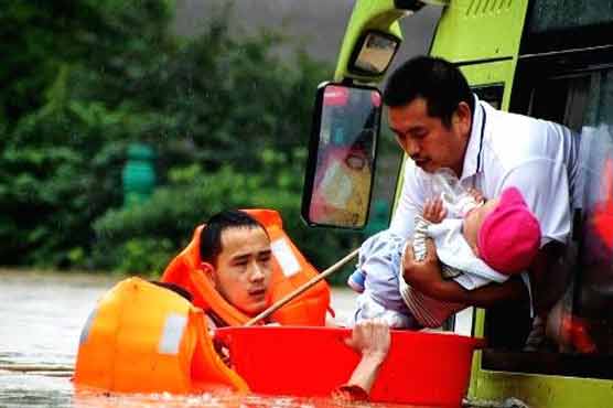 Rainstorms in China leave 18 dead
