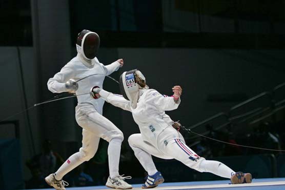 Olympics: Moutoussamy, 14, makes fencing history   