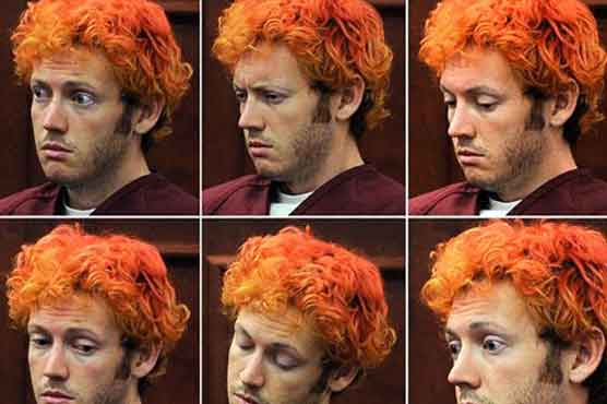US shooting suspect in court with orange hair