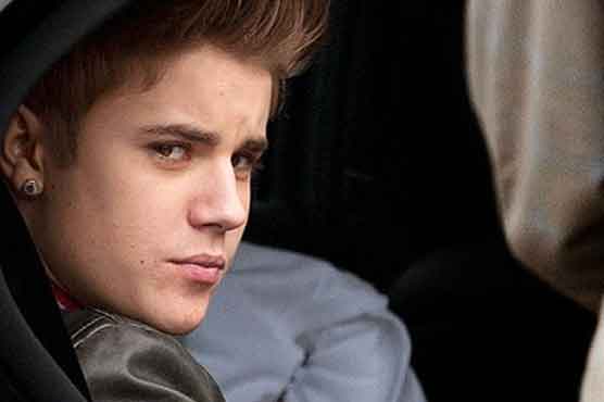 Paparazzo charged with crime in Bieber chase