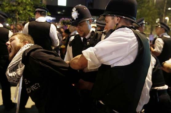 Police arrest protesters near Olympic Park
