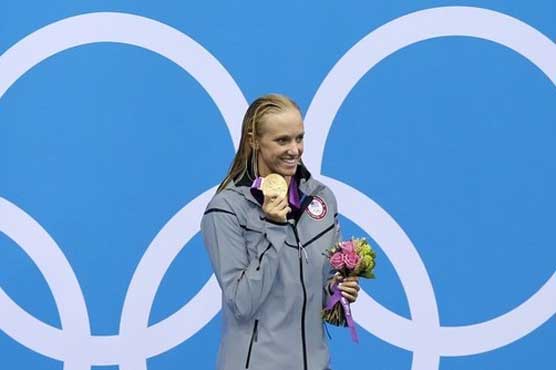 Dana Vollmer sets world record in 100 fly