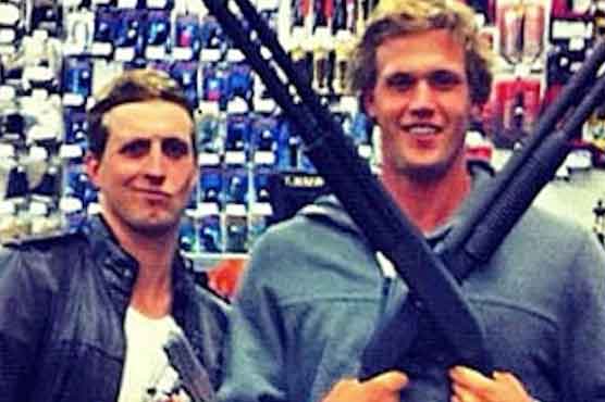 Swimming: Australian Olympians apologise over gun storm 