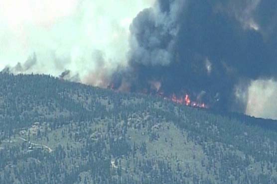 Raging wildfires prompt evacuations in Colorado