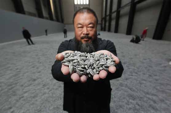 Artist Ai Weiwei says China rulers crushing dissenting voices