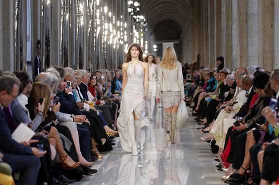 Fashion meets art at Louvre