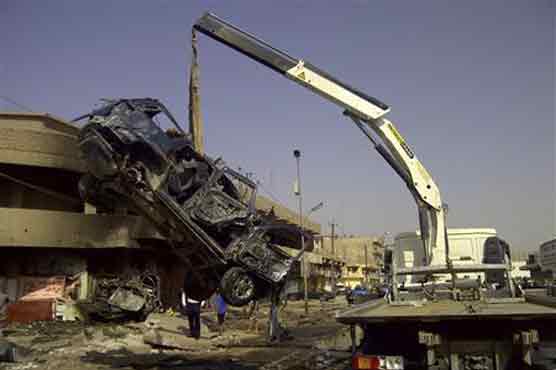 Car bombs kill 65 pilgrims in Iraq 