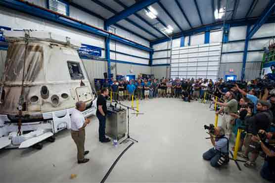 NASA chief views history-making SpaceX capsule