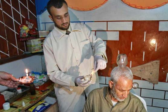 Gaza men turn to traditional cupping therapy