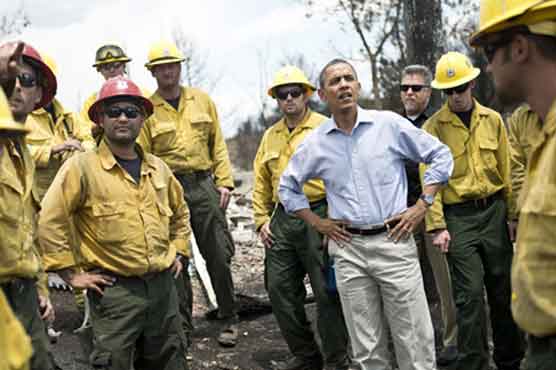 Obama visits scene of raging Colorado wildfire