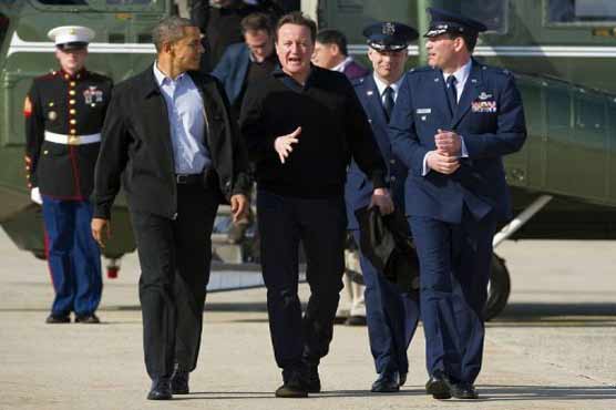 Cameron greeted at White House before Iran war talk