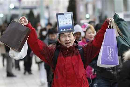 Apple touches record high as iPad 3 sales run hot