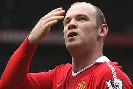 Rooney sorry after breaking young fan's wrist