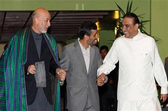 Zardari, Ahmadinejad, Karazi arrive in Tajikistan