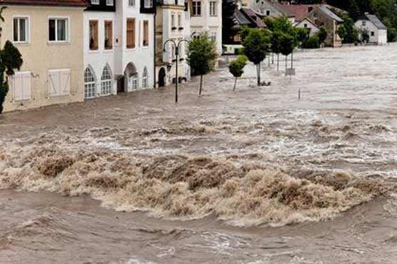 Extreme rainfall, heat waves linked to global warming