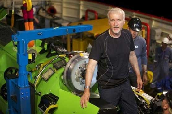 Cameron returns after a dive into Pacific Ocean