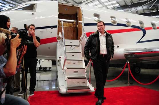 Actor-pilot John Travolta promotes Australia-Chile flights