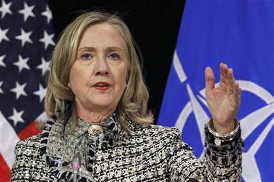 Clinton arrives in Beijing