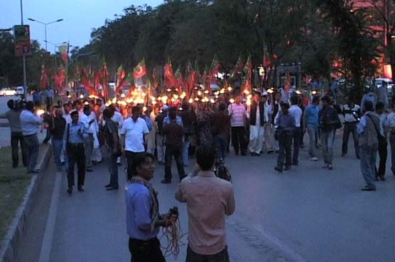 PTI torch bearing rally to express solidarity with CJ