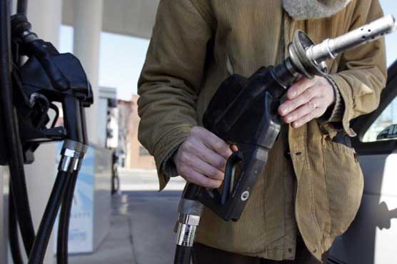 Oil hovers below $98 amid weak US, Europe demand