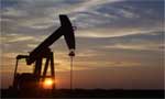 Oil falls to below $97 as US crude supplies jump