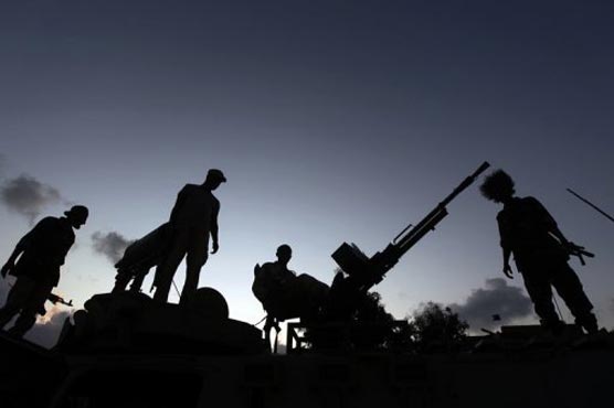 Libya ex-rebels in deadly raid on government HQ 