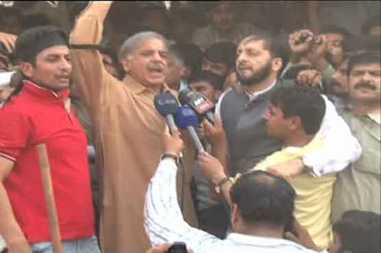 Shahbaz joins protest against power outages