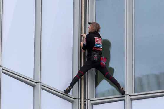 'Spiderman' climbs France's tallest building