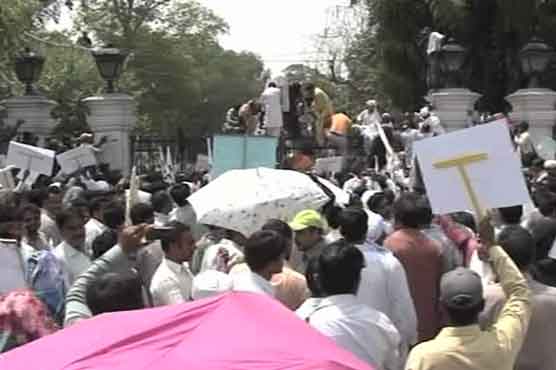 Population deptt employees stage protest for job security