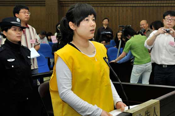 China stays businesswoman's execution after outcry
