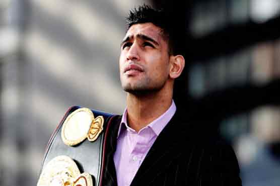 Amir Khan to make ring return in July