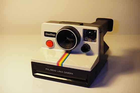 Boy buys Polaroid carrying grandma's dead son picture