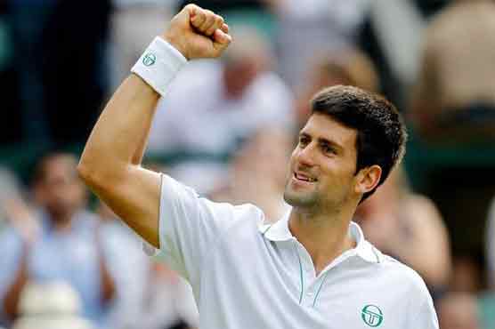  Djokovic, Azarenka reach 3rd round at French Open
