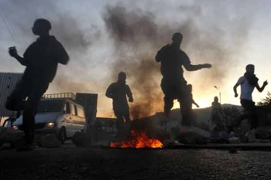 In Israel, Clinton calls for de-escalation in Gaza