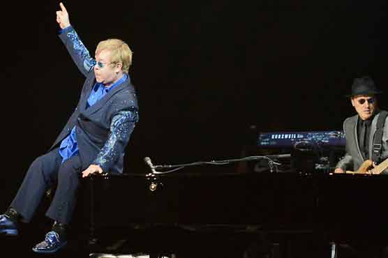 Elton John dedicates show to Chinese artist Ai 
