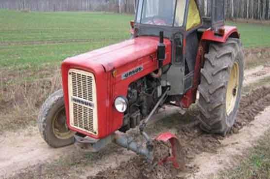 Drunk farmer drives three wheeled tractor