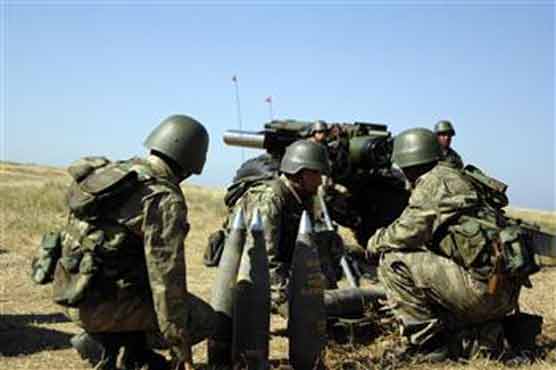 Turkish troops halt artillery fire into Syria 