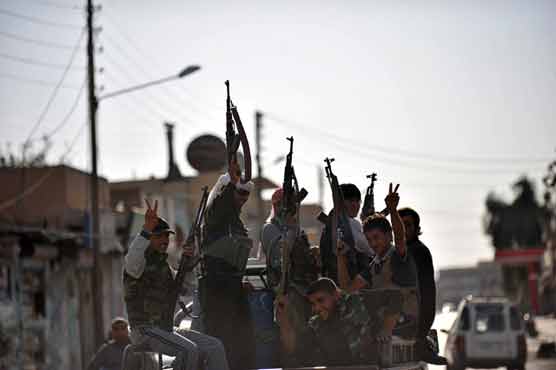 50 dead as Syria rebels take border town