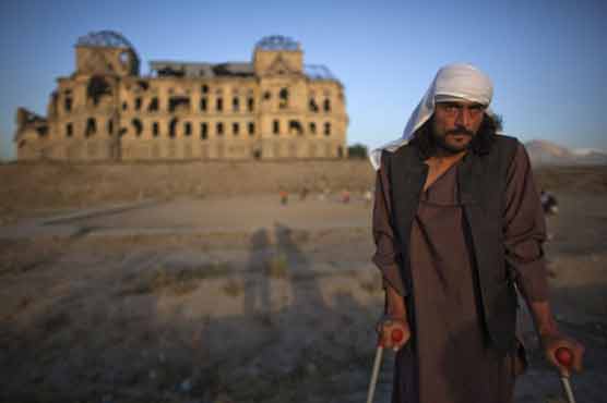 Afghanis recall horrors as war enters 12th year 