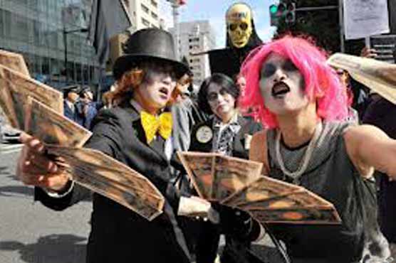 Anti-IMF activists stage rally in Tokyo