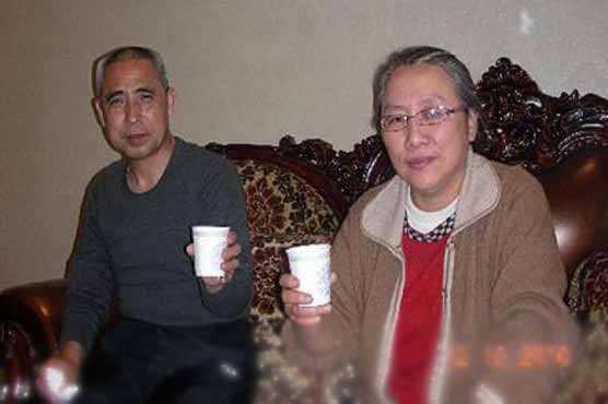 Wife of detained Chinese activist says he's ill 