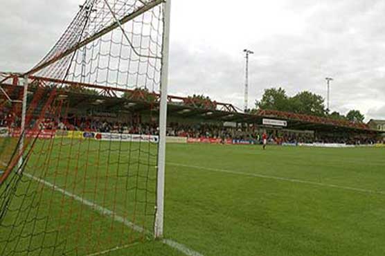 Football: Singapore to fine 'bottom two club'